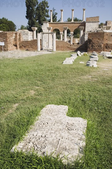 Selcuk, Izmir Province, Turkey. Partially reconstructed wall of the 6th century Basilica of St. John the Apostle with masonry pieces in the foreground. Turkey Turkish Eurasia Eurasian Europe Asia Turkiye Izmir Province Selcuk St Basilica Saint John Apostle Ruin Ruins Destination Destinations European History Historic Middle East South Eastern Europe Western Asia