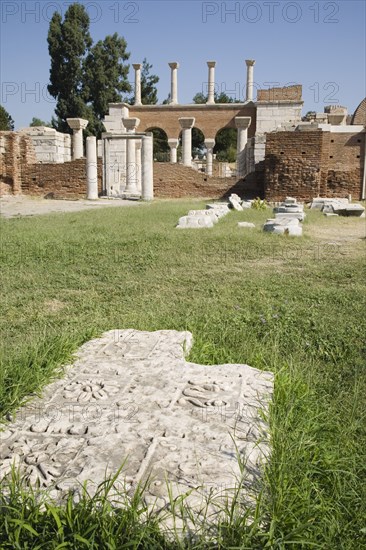 Selcuk, Izmir Province, Turkey. Partially reconstructed wall of the 6th century Basilica of St. John the Apostle with masonry pieces in the foreground. Turkey Turkish Eurasia Eurasian Europe Asia Turkiye Izmir Province Selcuk St Basilica Saint John Apostle Ruin Ruins Destination Destinations European History Historic Middle East South Eastern Europe Western Asia