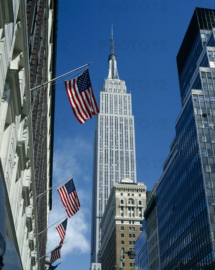 New York, New York State, USA. Empire State Building seen from Macys department store on 34th Street American Blue Color North America Northern Shop United States of America