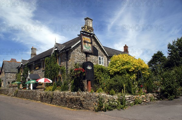 England, Devon, Upottery, Public House exterior with walled beer garden