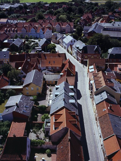 Denmark, Jutland, Ribe, View south-west over city rooftops and cobbled street from the twelth century Domkirke tower. Ribe is Scandinavias oldest town dating from about 700 AD.