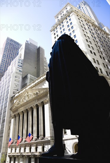 USA, New York, New York City, Manhattan  The New York Stock Exchange building in Broad Street beside Wall Street showing the main facade of the building featuring marble sculpture by John Quincy Adams Ward in the pediment called Integrity Protecting the W