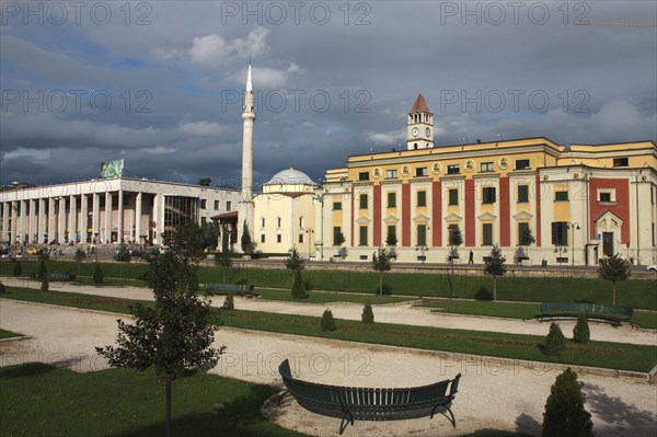 Albania, Tirane, Tirana, Exterior facade of government buildings  Ethem Bey Mosque and Opera House on Skanderbeg Square.