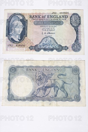 Business, Finance, Money, The front and reverse of a very old English five pound note.