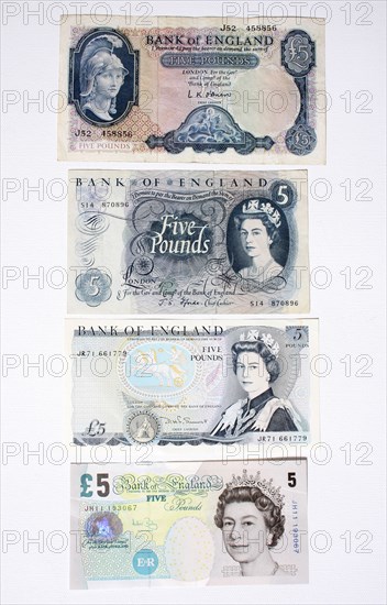 Business, Finance, Money, Four different English five pound notes spanning sixty years.