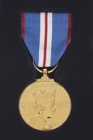 England, Award, Medal, A commemorative medal awarded to a Thames Valley police woman  to celebrate the Queens Golden Jubilee in 2002.
