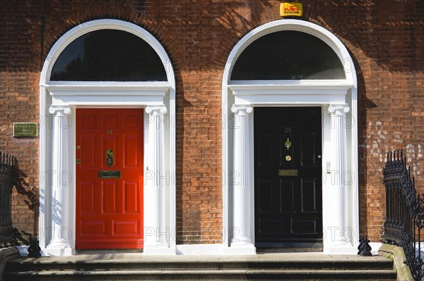Ireland, County Dublin, Dublin City, Red and black Georgian doors in the city centre south of the Liffey River.