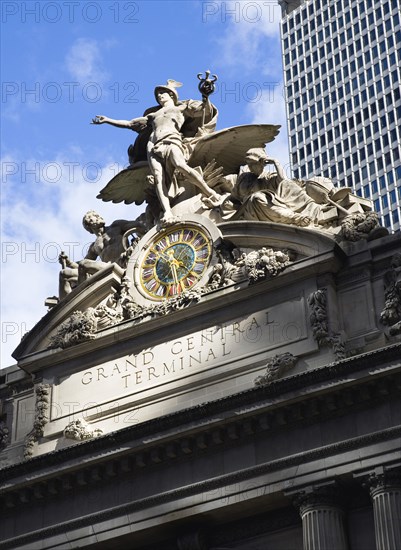USA, New York, New York City, Manhattan  Sculpture by Jules-Alexis Coutans of Mercury  Hercules and Minerva on the 42nd Street facade of Grand Central Terminal railway station.