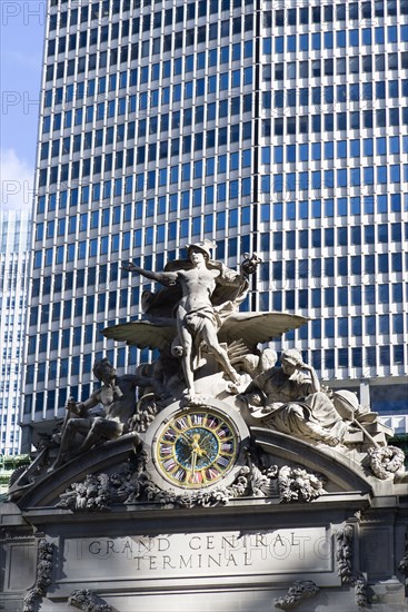 USA, New York, New York City, Sculpture by Jules-Alexis Coutans of Mercury  Hercules and Minerva on the 42nd Street facade of Grand Central Terminal railway station.