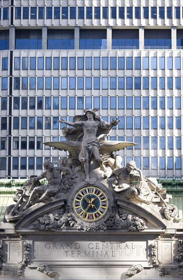 USA, New York, New York City, Sculpture by Jules-Alexis Coutans of Mercury  Hercules and Minerva on the 42nd Street facade of Grand Central Terminal railway station.