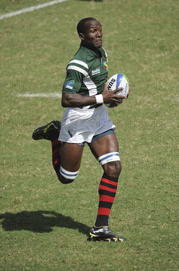 India, Delhi, 2010 Commonwealth games  Rugby competitor running with the ball.