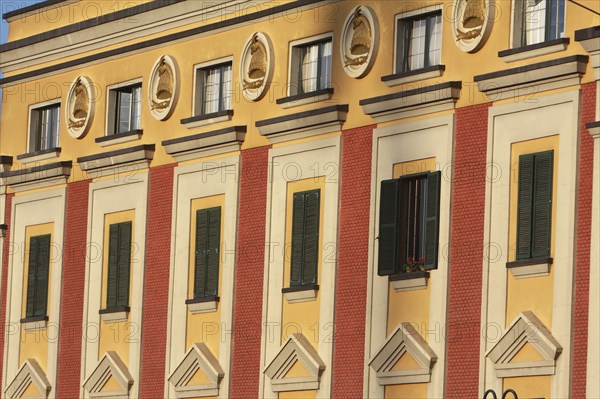 Albania, Tirane, Tirana, Detail of the facade of the government buildings on Skanderbeg Square.