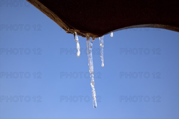 Weather, Winter, Ice, Icicles hanging from household facia panel.