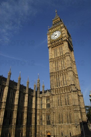 England, London, Westminster, Angled view looking up at Big Ben clock tower