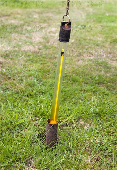 Climate, Weather, Measurements, Thermometer for measuring ground temperature being removed from a meter long tube at the Bognor Regis weather station.