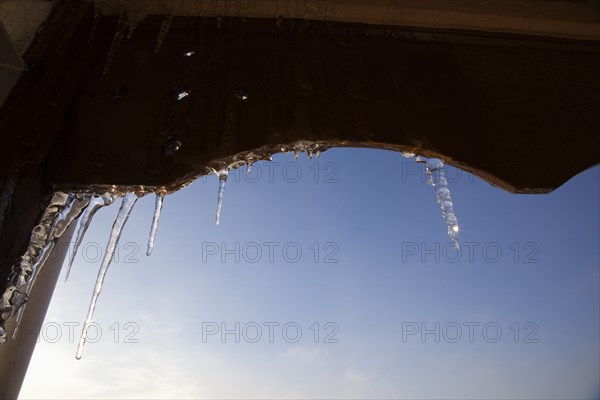 Weather, Winter, Ice, Icicles hanging from household facia panel.