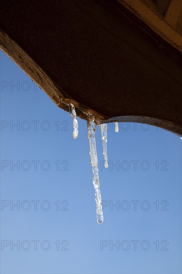 Weather, Winter, Ice, Icicles hanging from household facia panel.