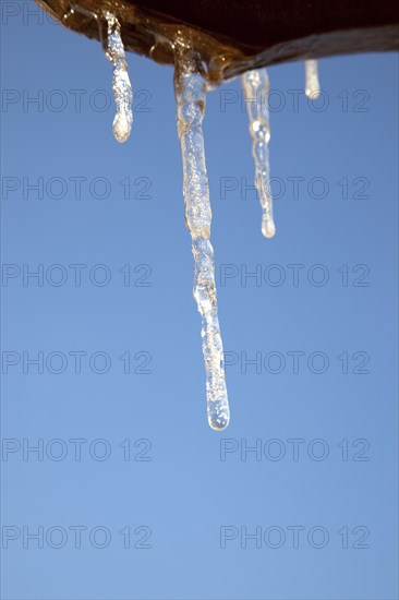 Weather, Winter, Ice, Icicles hanging from household facia panel.