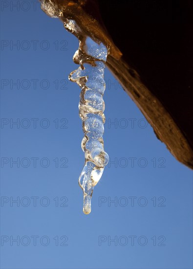 Weather, Winter, Ice, Icicles hanging from household facia panel.