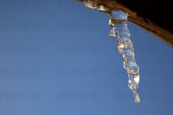 Weather, Winter, Ice, Icicles hanging from household facia panel.