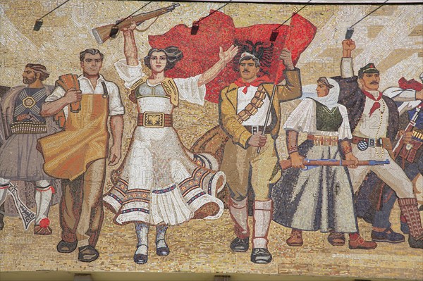 Albania, Tirane, Tirana, National History Museum. Detail of mosaic on the exterior facade of the National History Museum in Skanderbeg Square representing the development of Albanias history.
