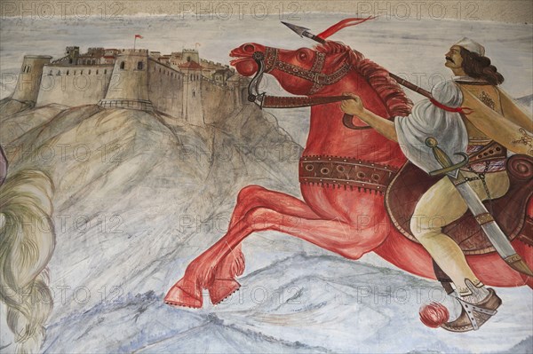Albania, Kruja, Mural on the wall of the National Skanderbeg Museum depicting battle scene.