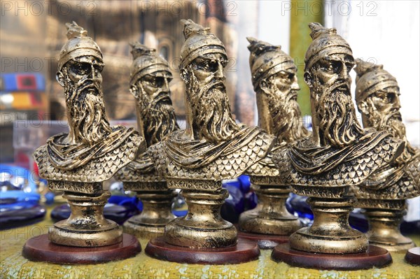 Albania, Kruja, Souvenirs displayed for sale on stalls in the market bazaar in the old town.