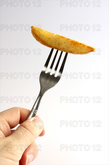 Food, Cooked, Chips, Deep fried chip on a fork.