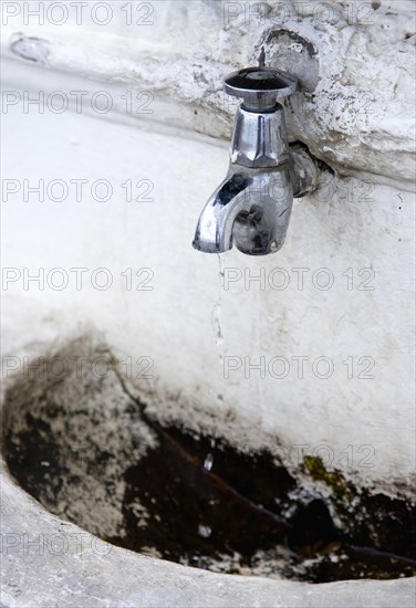 England, West Sussex, Bognor Regis, Free drinking water tap on the promenade beside the beach.