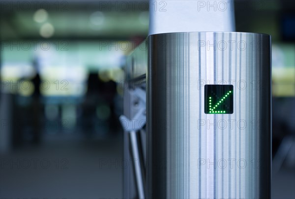 Ireland, County Dublin, Dublin City, Ballsbridge  Lansdowne Road  Aviva Stadium Stainless steel Turnstile at entrance with green LED arrow pointing to the left.