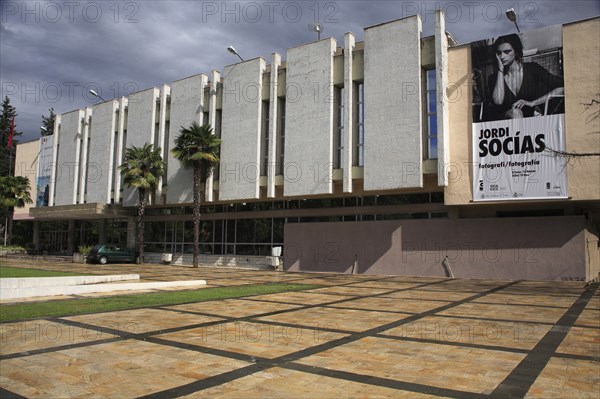 Albania, Tirane, Tirana, National Art Gallery  exterior facade with advertising for photography exhibition.