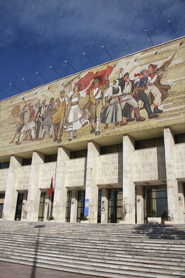 Albania, Tirane, Tirana, National History Museum. Mosaic on the exterior facade of the National History Museum in Skanderbeg Square representing the development of Albanias history.