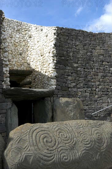 Ireland, Meath, Newgrange, Carved kerb stone outside the entrance to the historical burial site that dates from 3200BC