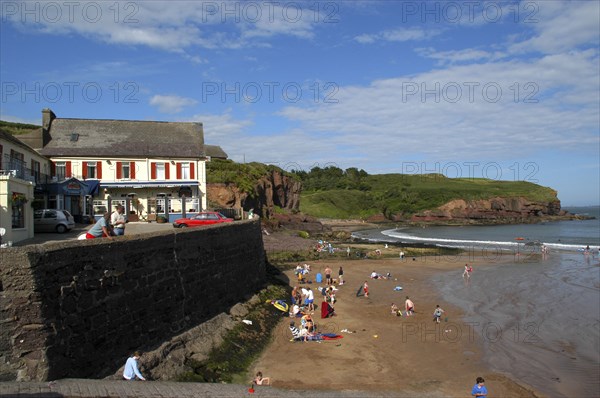 Ireland, General, Seaside scene with sandy beach and The Strand seafood restaurant above