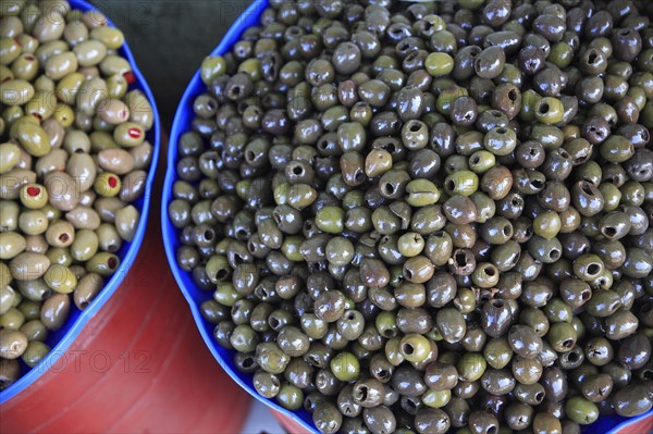 Albania, Tirane, Tirana, Bowls of olives displayed for sale in the Avni Rustemi Market.