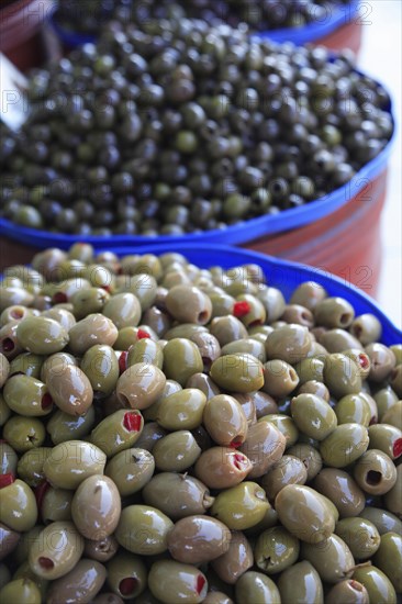 Albania, Tirane, Tirana, Display of black  and stuffed green olives for sale in Avni Rustemi Market.