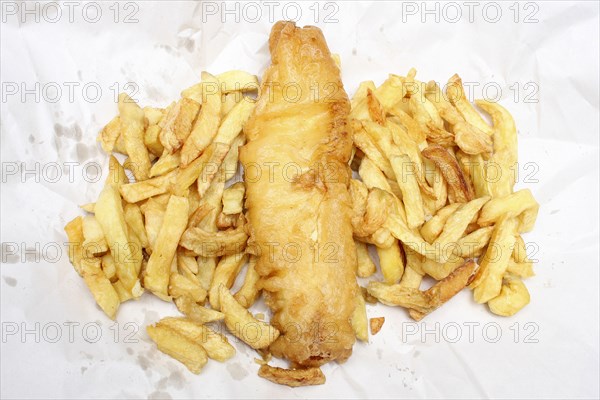 Food, Fast Food, Fish and Chips, Deep fried battered cod and chips from Fish and Chip shop  still in their paper wrapping.
