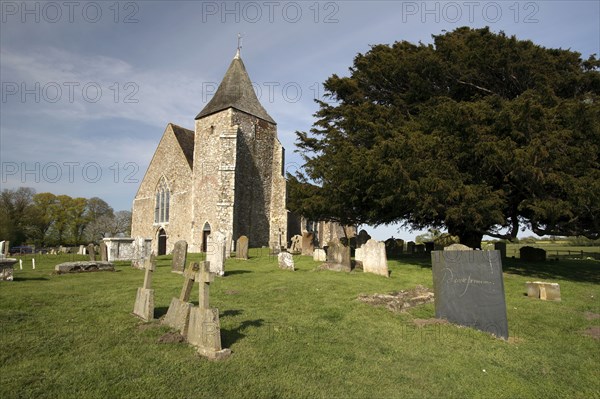 England, Kent, Romney Marshes, Old Romney  Derek Jarmans modern headstone the graveyard of St Clements church.