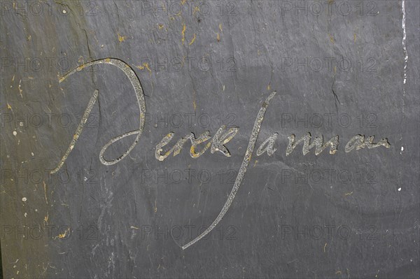 England, Kent, Romney Marshes, Old Romney  Detail of Derek Jarmans modern headstone the graveyard of St Clements church.