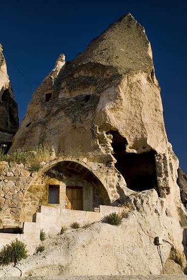 Cave dwelling wth visible erosion of wall. Photo: Hugh Rooney