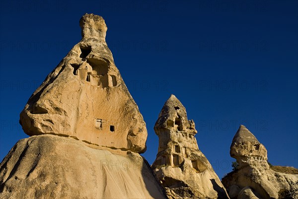 Pigeon Valley. Fairy Chimney rock formations with dovecotes. Pigeon droppings are used as a fertiliser. Photo : Hugh Rooney