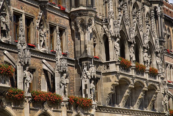 Marienplatz. Aerial view of the New Town Hall or Neues Rathaus built 1867-1908 designed by Georg von Hauberrisser in Gothic Revival style. Detail of facade. Photo: Hugh Rooney