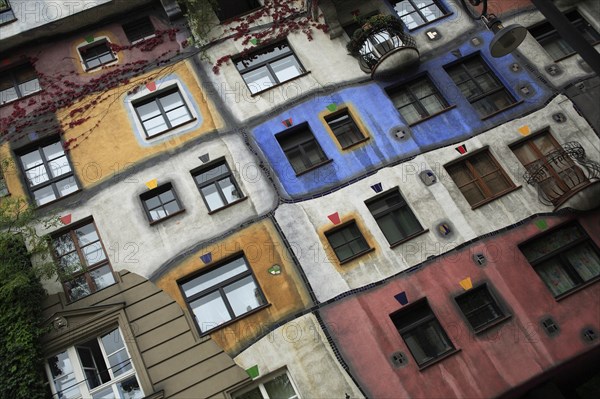 The Hundertwasser-Krawinahaus angled part view of exterior facade of apartment building. Photo: Bennett Dean