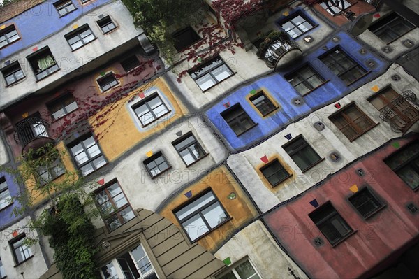 The Hundertwasser-Krawinahaus angled part view of exterior facade of apartment building. Photo : Bennett Dean