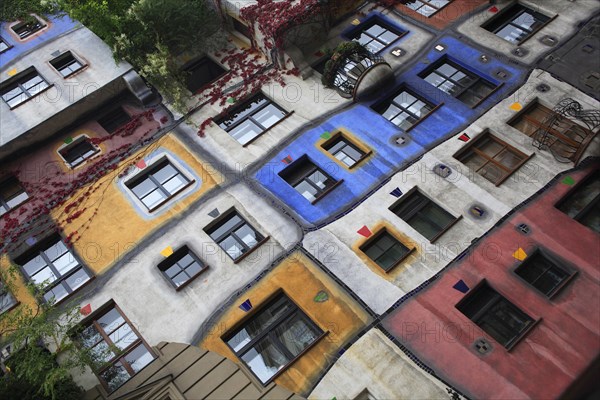 The Hundertwasser-Krawinahaus angled part view of exterior facade of apartment building. Photo : Bennett Dean