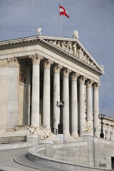 Parliament building. Colonnaded exterior facade. Photo : Bennett Dean