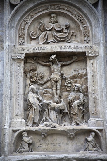 Stone carving of the crucifixion on the outside of the Stephansdom Cathedral. Photo: Bennett Dean