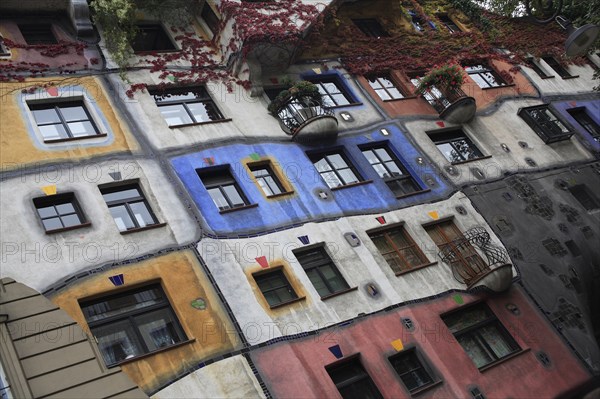 The Hundertwasser-Krawinahaus angled part view of exterior facade of apartment building. Photo: Bennett Dean