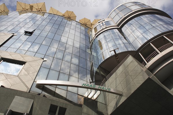 Exterior detail of the Haas Building or Haas Haus. Modern glass fronted and concrete office building in Saint Stephens Square. Photo: Bennett Dean