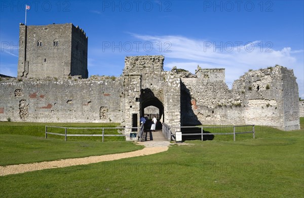 Portchester Castle showing the Norman 12th Century Tower and 14th Century Keep beyond the bridge over the moat built within the Roman 3rd Century Saxon Shore Fort. Photo : Paul Seheult